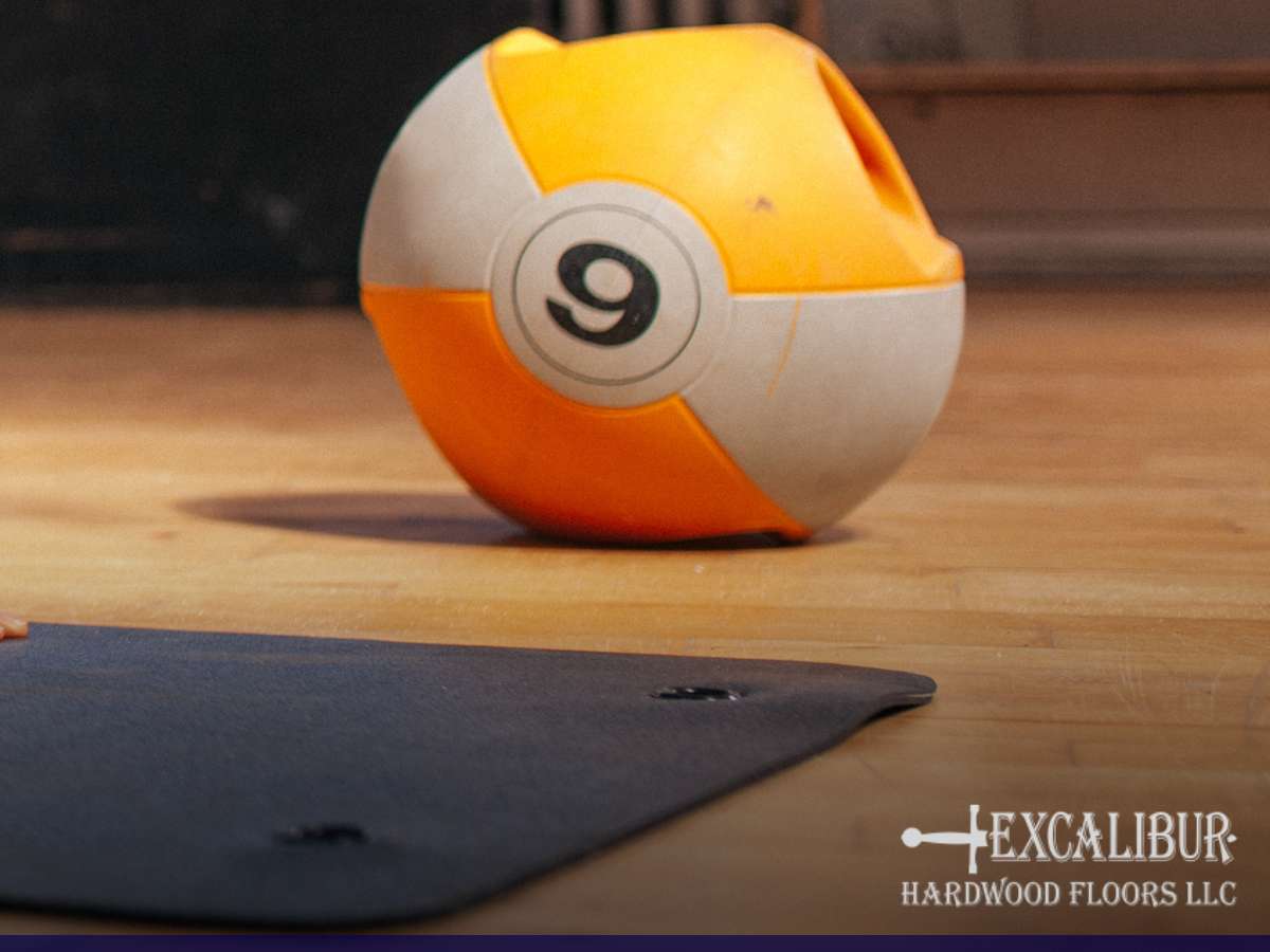 Exercise ball on hardwood gym floors highlighting durability and maintenance